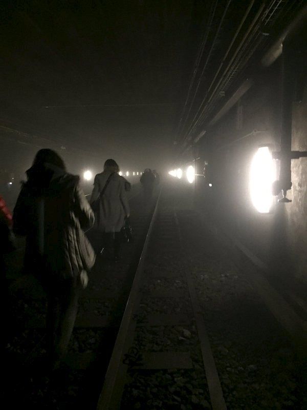 Passengers walk on underground metro tracks to be evacuated after an explosion at Maelbeek train station in Brussels, Belgium, March 22, 2016, in this handout courtesy of @OSOSXE via twitter. REUTERS/Courtesy @OSOSXE via Twitter/Handout via Reuters ATTENTION EDITORS - THIS PICTURE WAS PROVIDED BY A THIRD PARTY. REUTERS IS UNABLE TO INDEPENDENTLY VERIFY THE AUTHENTICITY, CONTENT, LOCATION OR DATE OF THIS IMAGE. FOR EDITORIAL USE ONLY. NOT FOR SALE FOR MARKETING OR ADVERTISING CAMPAIGNS. FOR EDITORIAL USE ONLY. NO RESALES. NO ARCHIVE. THIS PICTURE IS DISTRIBUTED EXACTLY AS RECEIVED BY REUTERS, AS A SERVICE TO CLIENTS.