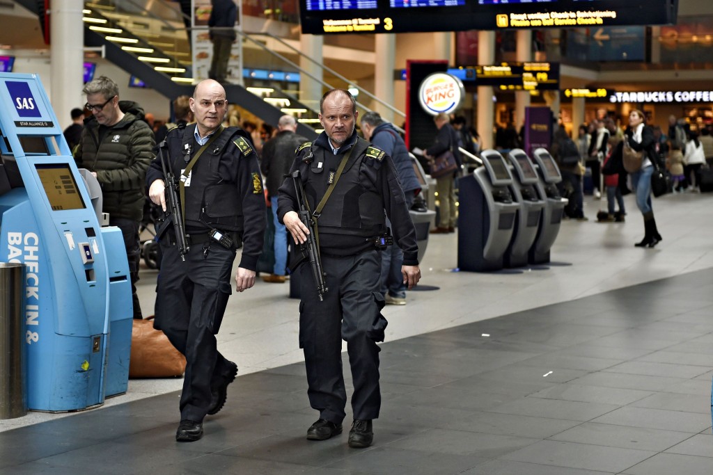Armed police is seen on patrol as police and airport's own security personnel have increased patrols at Copenhagen Airport, Denmark March 22 2016. Police in Denmark, Sweden and Finland have stepped up security at airports and public places following the explosions in Brussels on Tuesday. REUTERS/Liselotte Sabroe/Scanpix Denmark    ATTENTION EDITORS - THIS IMAGE WAS PROVIDED BY A THIRD PARTY. FOR EDITORIAL USE ONLY. NOT FOR SALE FOR MARKETING OR ADVERTISING CAMPAIGNS. THIS PICTURE IS DISTRIBUTED EXACTLY AS RECEIVED BY REUTERS, AS A SERVICE TO CLIENTS. DENMARK OUT. NO COMMERCIAL OR EDITORIAL SALES IN DENMARK. NO COMMERCIAL SALES.